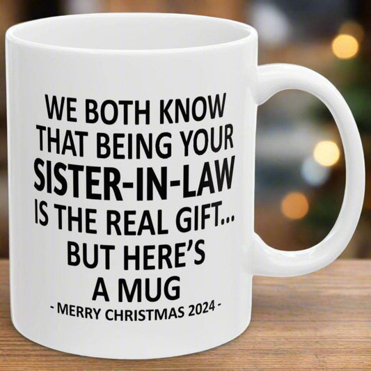 We Both Know That Being Your Sister-In-Law Is The Real Gift, But Here's A Mug, Funny Christmas 2024 Gift Coffee Mugs 11oz