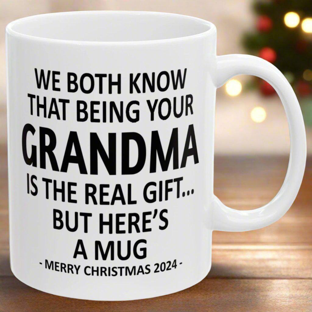 We Both Know That Being Your Grandma Is The Real Gift, But Here's A Mug, Funny Christmas 2024 Gift Coffee Mugs 11oz